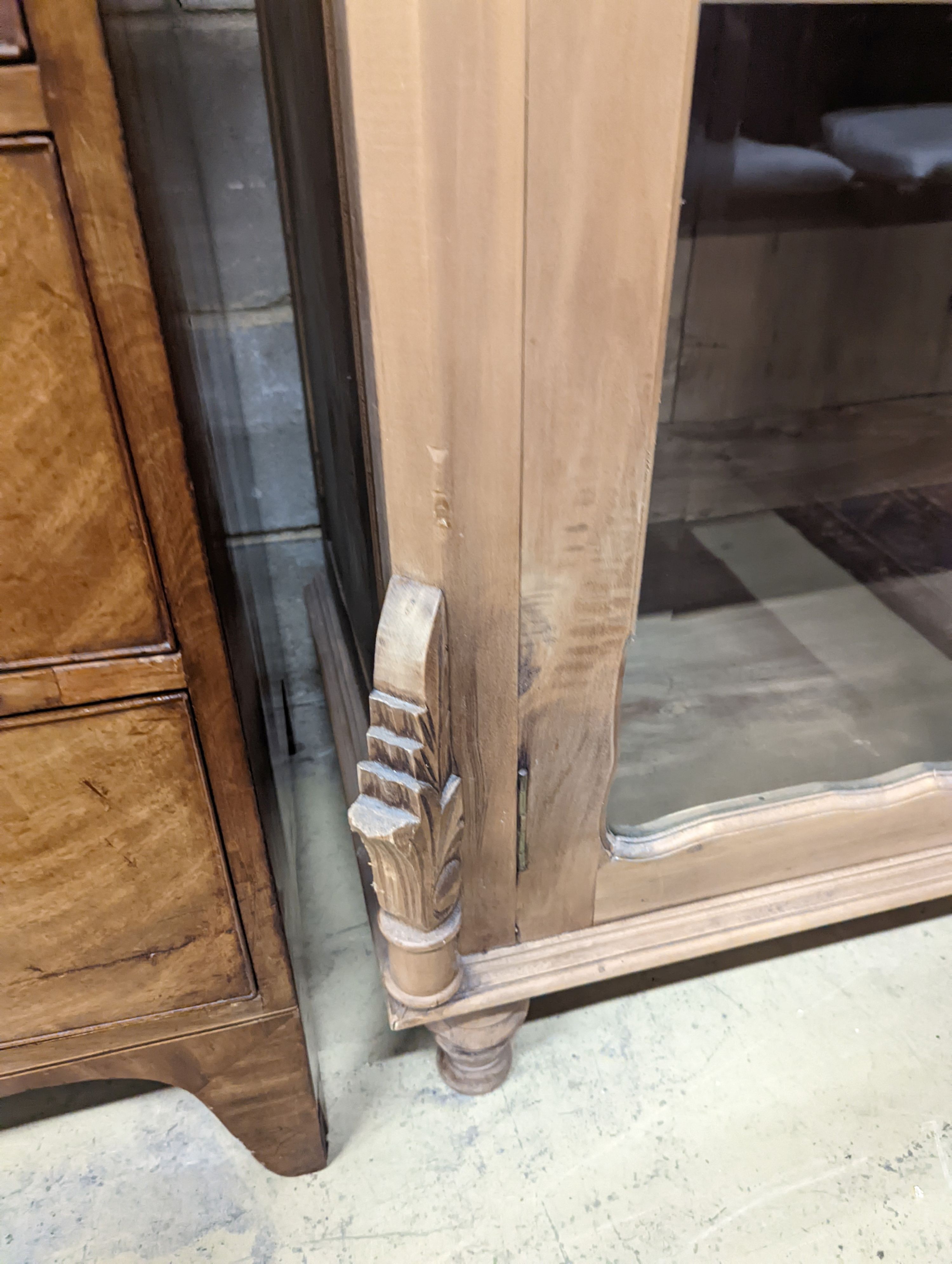 A French glazed pine two door armoire, width 100cm, depth 55cm, height 200cm